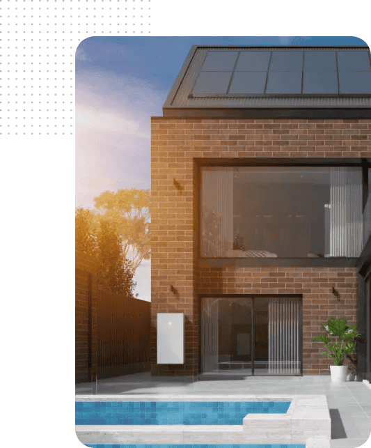 Modern home with solar panels and battery storage system on the roof and exterior wall.