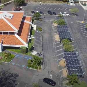 Solar panel array on parking lot roof.