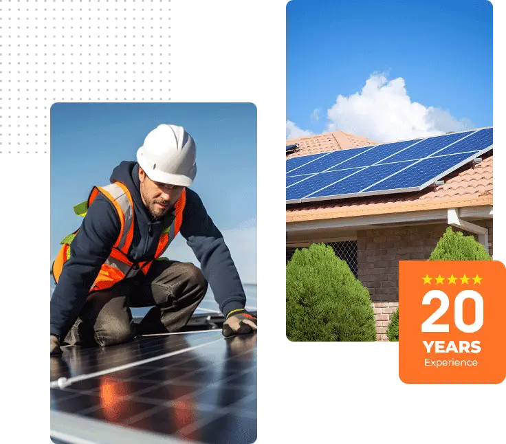 Technician installing solar panels on a residential roof under a clear blue sky.