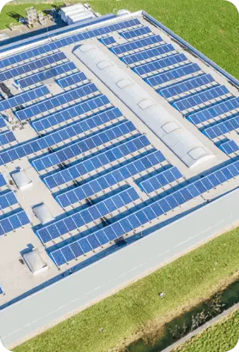 Solar panels installed on a commercial building rooftop for renewable energy.